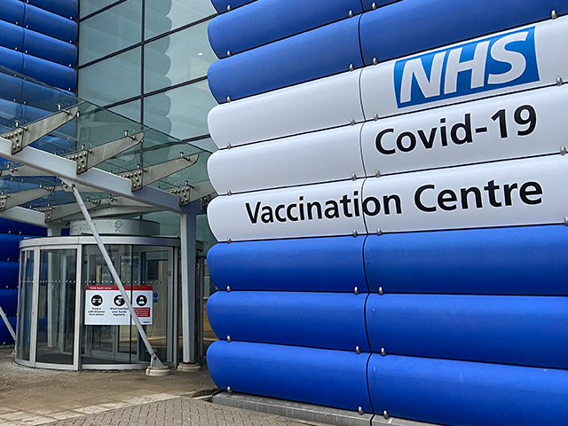 NHS Vaccination Centre Heathrow Building Branding